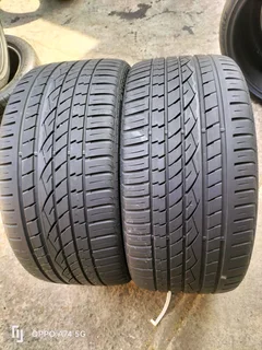 2x 305/30/23 continental Cross contact UHP