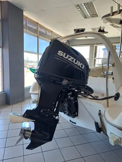 600 INDIGO ON TRAILER WITH DF140BTL SUZUKI 4 STROKE