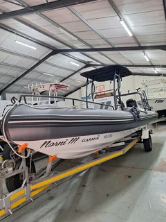 7.3M Infanta on galvanized trailer with 2 x 115HP MErcury 4 strokes