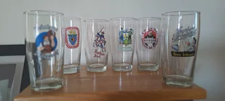Beer glasses with German logos