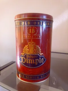 Dimple whisky round tin