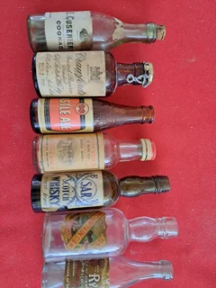 Antique miniature liquor bottles (empty}