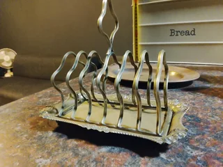 Antique silverware toast stand