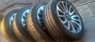 A set of 22&#34; range rover sport and defender mags and cooper discovery tyres