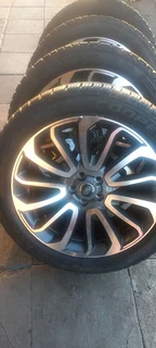 A set of 22&#34; range rover sport and defender mags and cooper discovery tyres