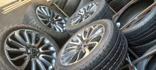 A set of 22&#34; range rover sport and defender mags and cooper discovery tyres