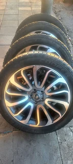 A set of 22&#34; range rover sport and defender mags and cooper discovery tyres
