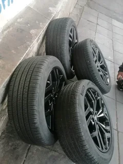 A set of 4 mags and tyres for Range Rover Evoque