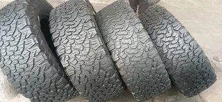 A set of bfgoodrich ko2 tyres 305/65/17 one new and. 3 good second hand