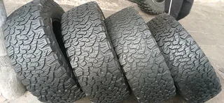 A set of bfgoodrich ko2 tyres 305/65/17 one new and. 3 good second hand