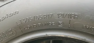 A set of bfgoodrich ko2 tyres 305/65/17 one new and. 3 good second hand
