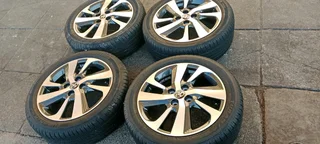 A set if 16&#34; Toyota yaris and starlet mags and Bridgestone tyres like new