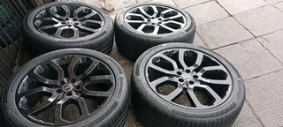 A set of 22" Range Rover sport mags and continental tyres