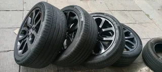 A set of 22" Range Rover sport mags and continental tyres