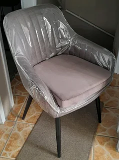 Grey chair with cushion