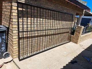 Gate, sliding and driveway