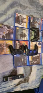 Playstation 4 slim with 10 games and 3 controllers