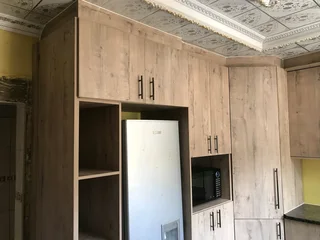 Fitted cupboards, tilling, ceilings,   building houses and vibrant walls and clear view