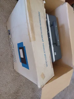 Bell and Howell 16 mm projector in original packaging.