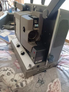 Bell and Howell 16 mm projector in original packaging.