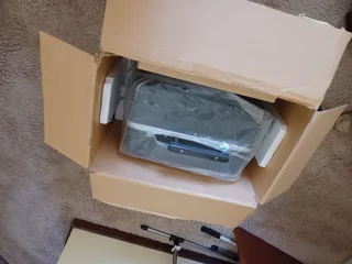 Bell and Howell 16 mm projector in original packaging.