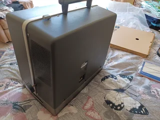 Bell and Howell 16 mm projector in original packaging.