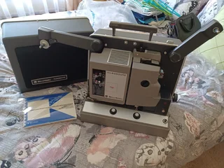 Bell and Howell 16 mm projector in original packaging.