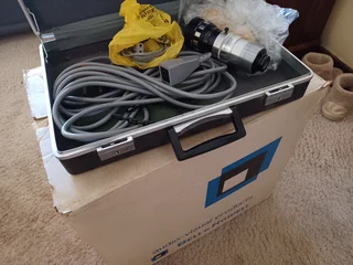 Bell and Howell 16 mm projector in original packaging.