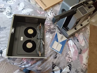 Bell and Howell 16 mm projector in original packaging.
