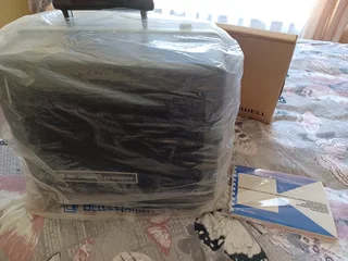 Bell and Howell 16 mm projector in original packaging.