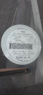 White Mazda 323 2.0L Sedan