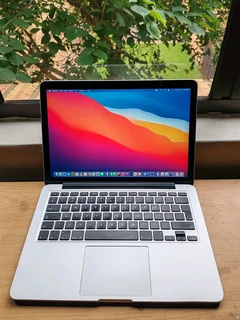 Core I5 Macbook Pro Mid 2015 Model 13inch  8gb Ram R5500