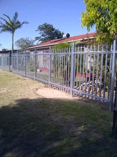 Palisade fencing and driveway gates