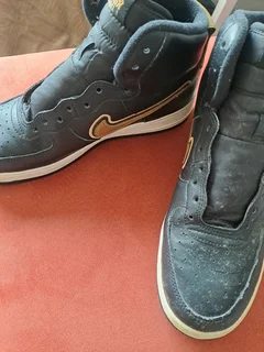 Black and gold high top airforce ones