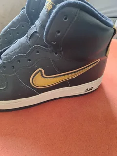 Black and gold high top airforce ones