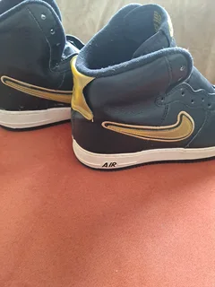 Black and gold high top airforce ones