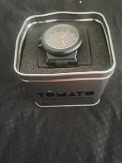 Black and sliver tomato watch