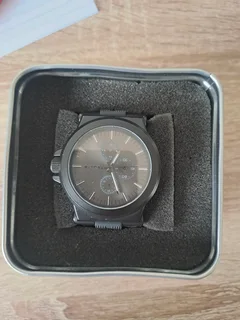 Black and sliver tomato watch