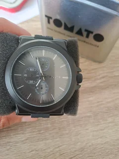 Black and sliver tomato watch