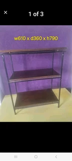 Shelving stand with steel legs