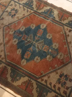 Persian carpet small not large carpet.