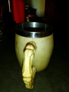 Resin made skull mug stainless steel inside in box new.