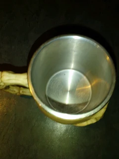 Resin made skull mug stainless steel inside in box new.