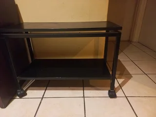 Wooden trolley on wheels.