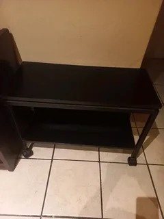 Wooden trolley on wheels.