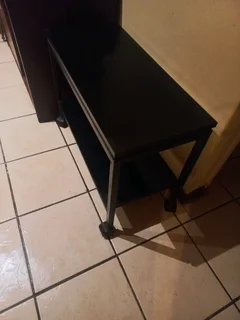 Wooden trolley on wheels.