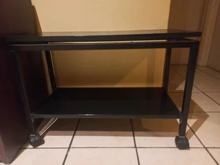 Wooden trolley on wheels.