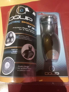 Electrical shaver brand new sealed in plastic holder.