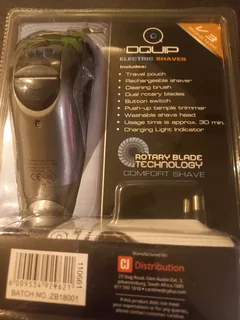 Electrical shaver brand new sealed in plastic holder.