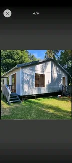 Two bedroom log home for sale